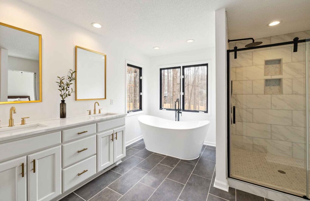 pre-move-services-tampa-bay-fl-benefits-of-professional-home-organizer-luxury-bathroom-soaking-tub-glass-shower-with-rainhead-exhale