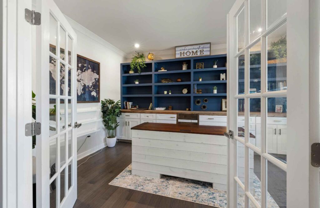 professional-home-organizer-palm-harbor-fl-letting-go-with-intention-home-office-french-doors-shiplap-desk-built-in-cabinets-and-shelves-dark-blue