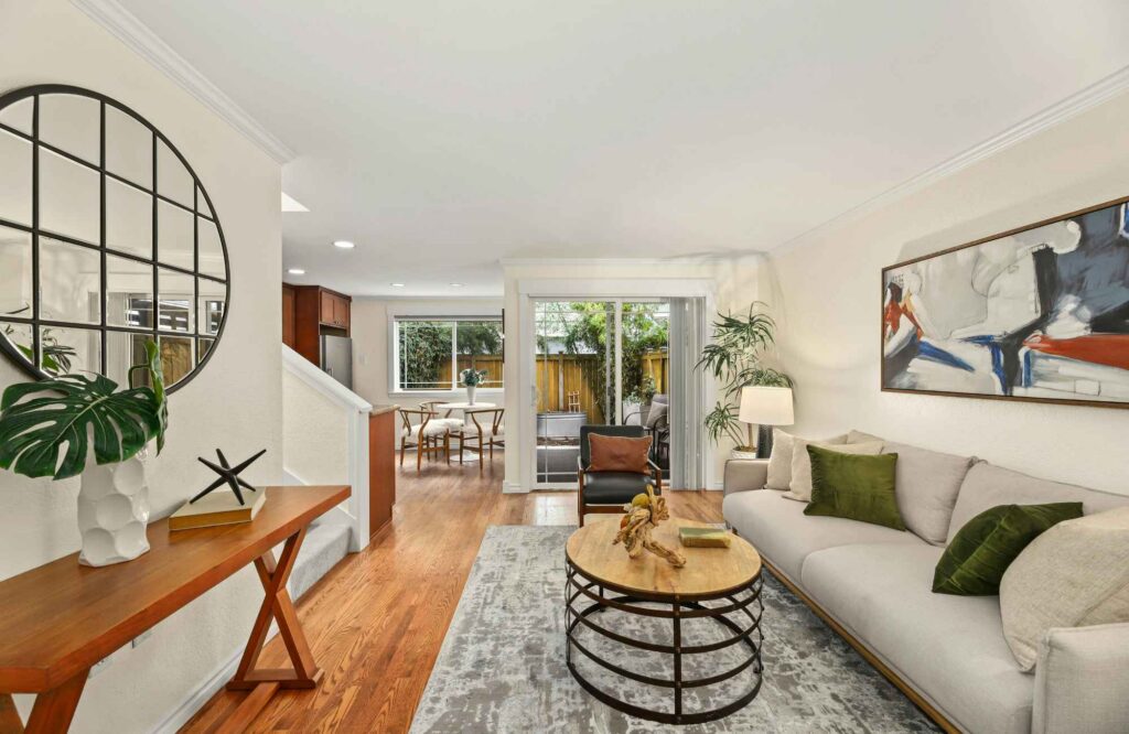 professional-home-organizer-odessa-fl-time-to-hire-organizer-living-room-comfortable-furnishings-round-mirror-and-coffee-table-elevate